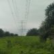 DISOAL: Saluran Udara Tegangan Ekstra Tinggi (SUTET) milik PLN yang melintasi wilayah Desa Ubrug, Kecamatan Warungkiara, Kabupaten Sukabumi disoal warga terkait dengan legalitas tanahnya. FOTO: KARIMULLAH//INILAHSUKABUMI.COM