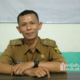 Kepala Desa Warungkiara, Kecamatan Warungkiara, Kabupaten Sukabumi, Ade Suherdi, saat memberikan penjelasan kepada inilahsukabumi.com, Senin (9/3/2026). Foto: KARIMULLAH//INILAHSUKABUMI.COM